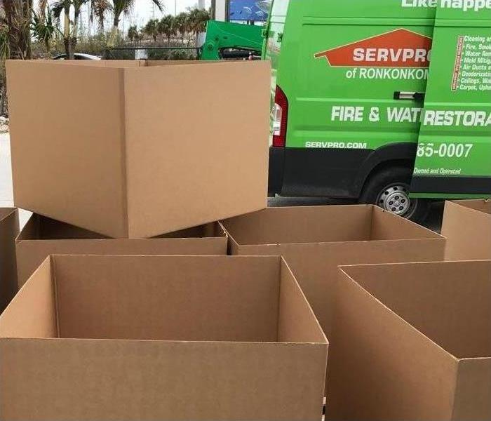 Our team is hard at work cleaning up the mess in Louisiana and Florida! - Image of empty boxes