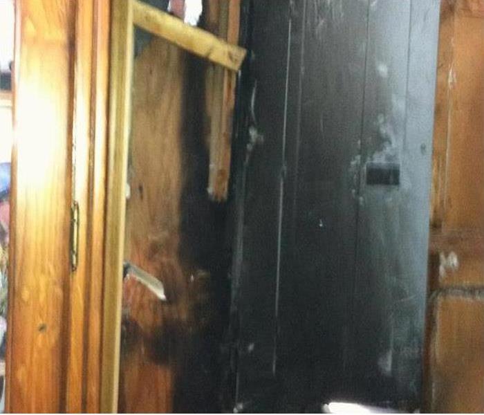 Here is an image of the source of loss for this particular home. A faulty electrical panel had caught fire